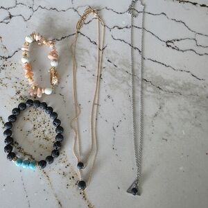 Two Necklaces And Two Bracelets Can Be Used With Essential Oils.